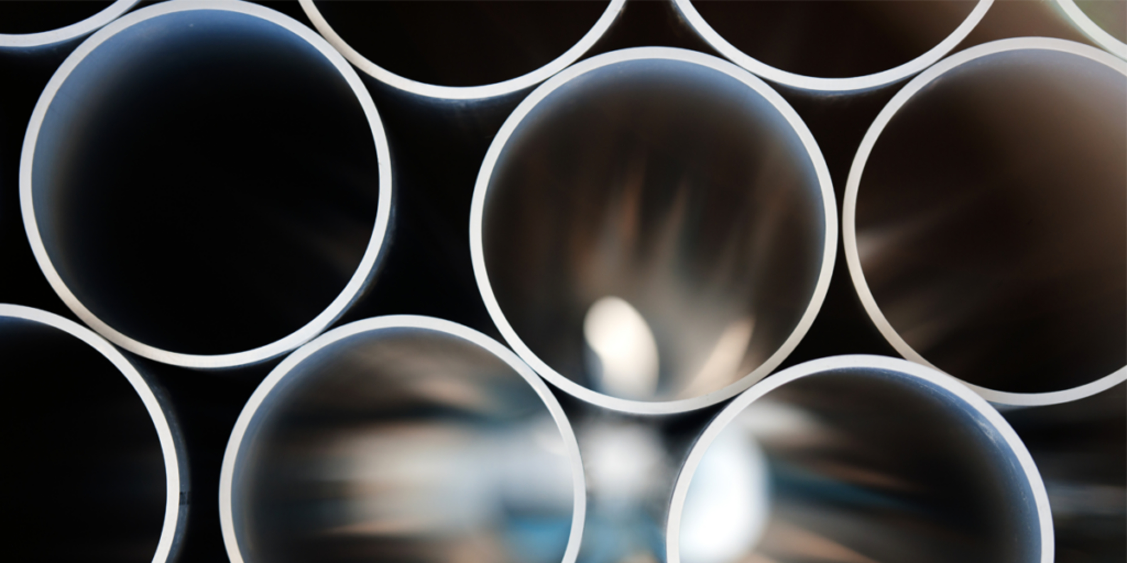 group of pipes symbolizing the integration and delivery process in software development