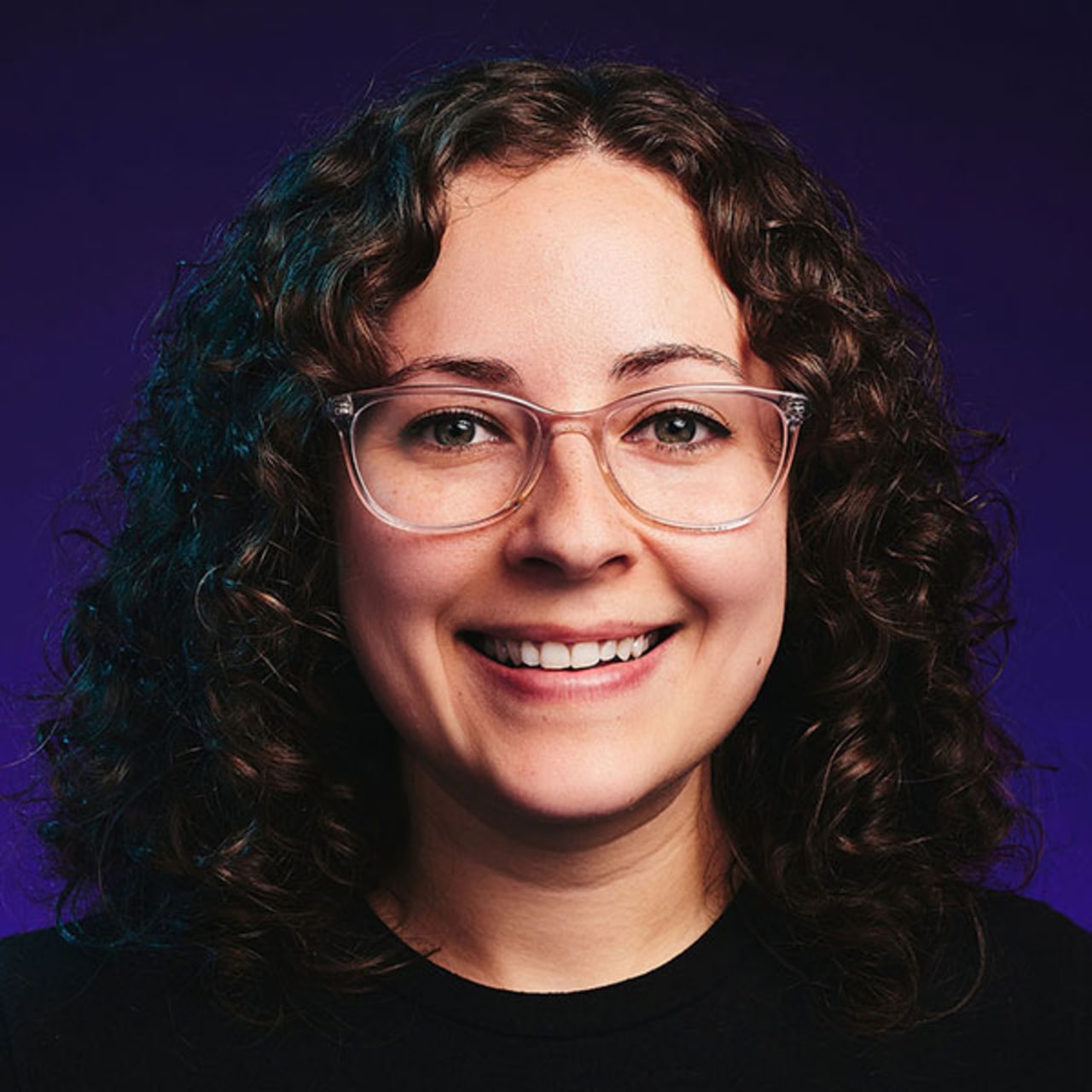 Headshot of Marisa Gomez, Senior Software Engineer at Cuttlesoft, expert in full-stack development. The professional photo shows a woman with a poised, experienced expression that reflects her global perspective and technical versatility. Her confident demeanor speaks to her expertise in mobile development, particularly with React Native, iOS, and Android platforms. The photo captures her professional approach to crafting solutions for major clients, while her engaging expression suggests her collaborative nature in working across web technologies including JavaScript, Ruby on Rails, and AWS consulting projects.