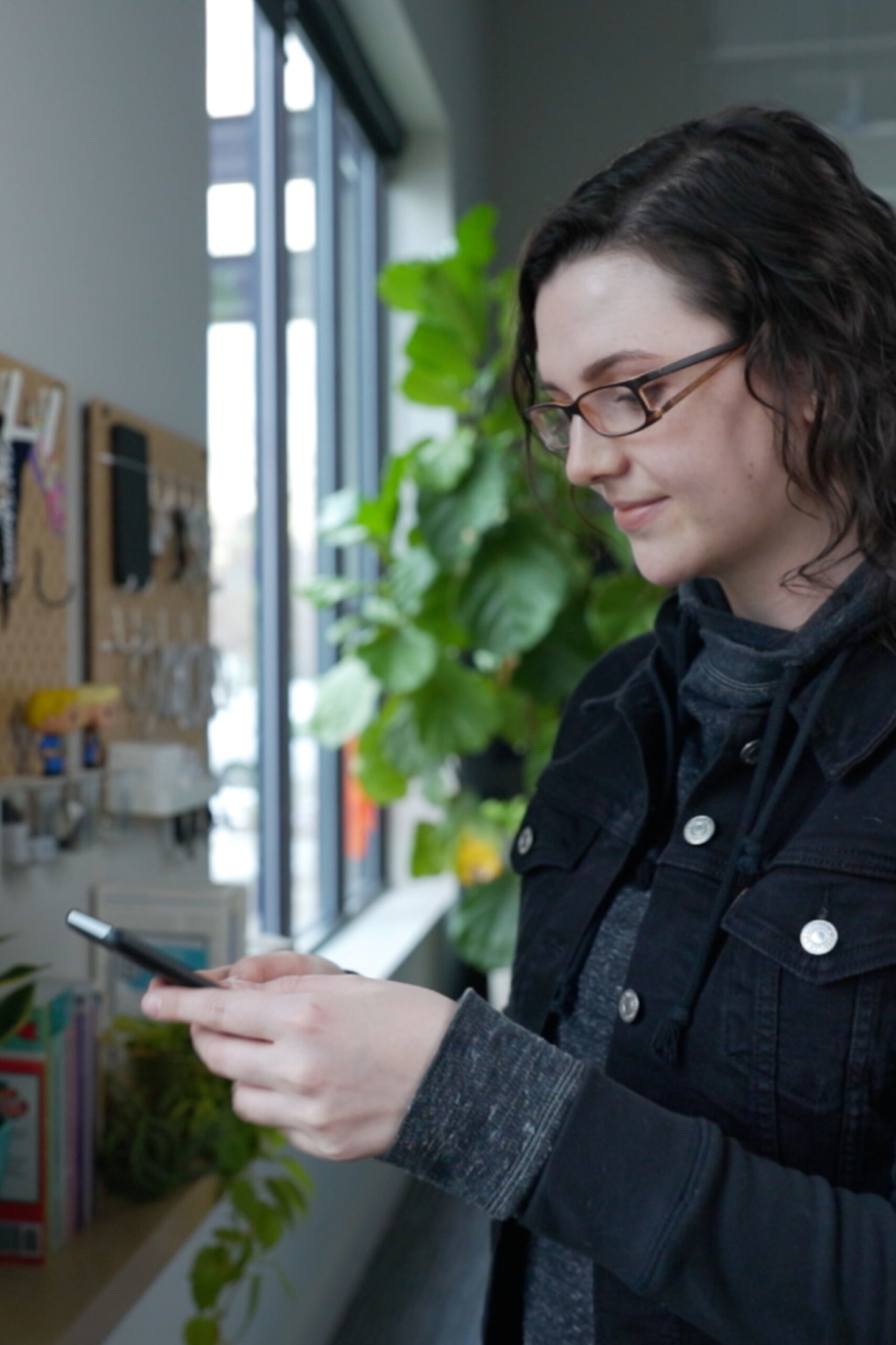 Andrea selects an Android phone to test a client's React Native app on.