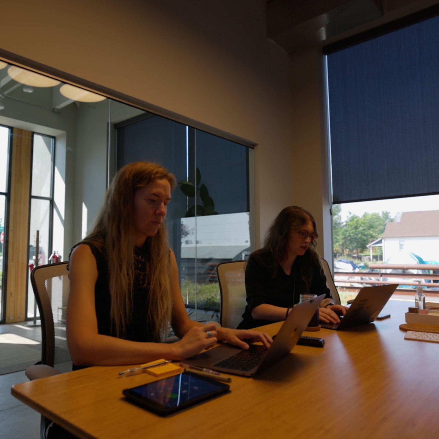 Emily and Sara meet with a client using Google Cloud to run their non-profit's custom software application.