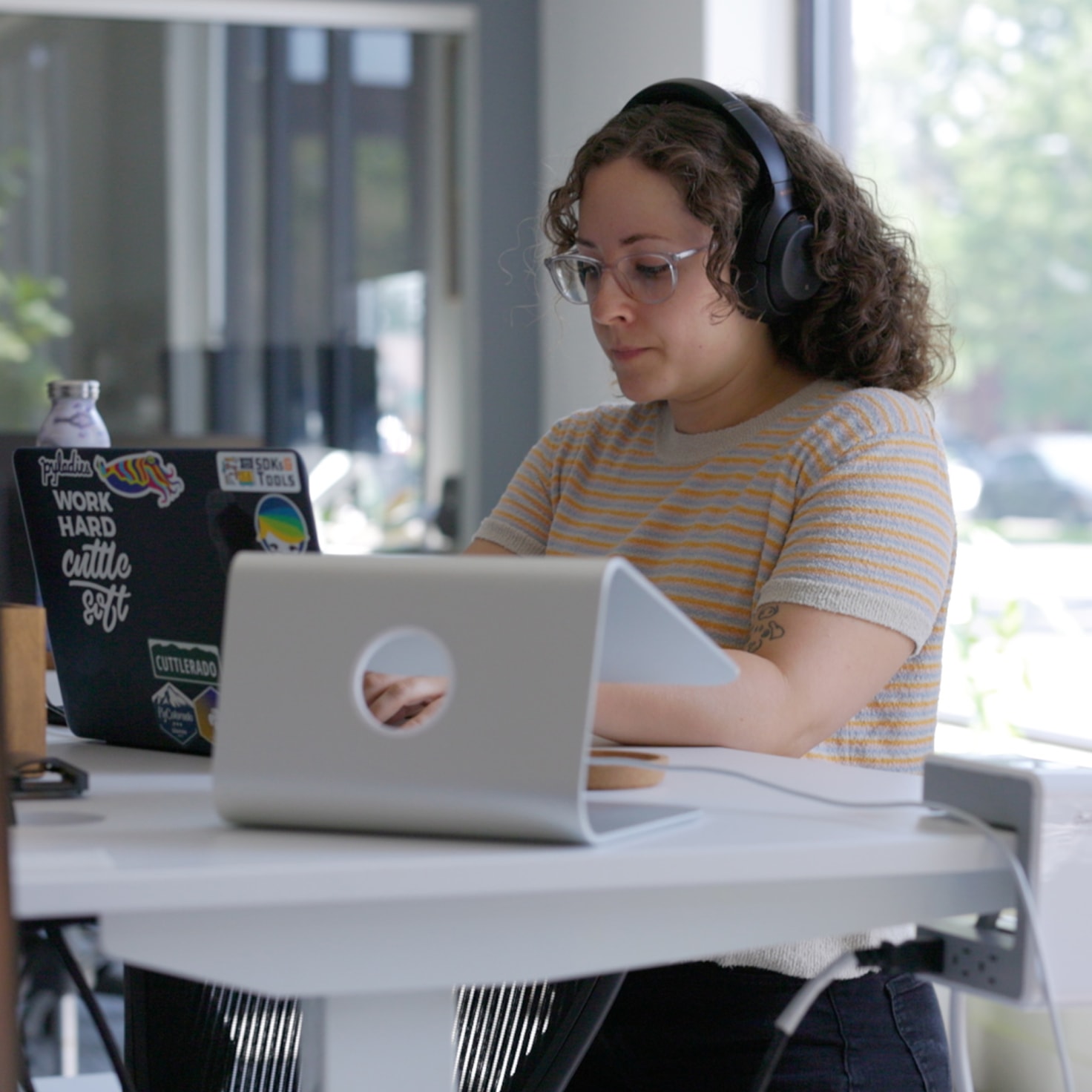 Marisa works with Android Studio to develop new features for a client's application.