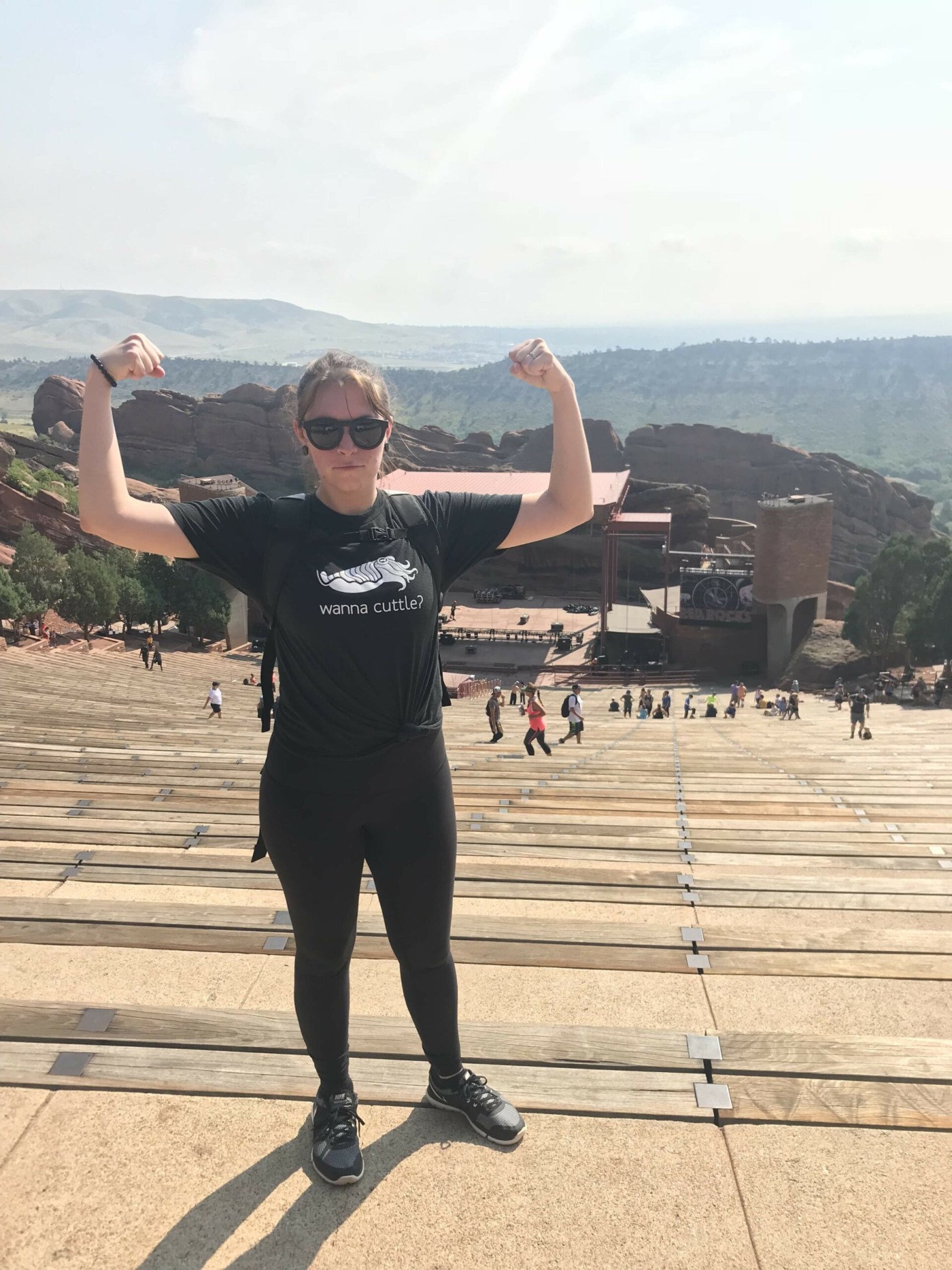 Living the Denver dream: Emily at Red Rocks, where even our company swag feels at home.