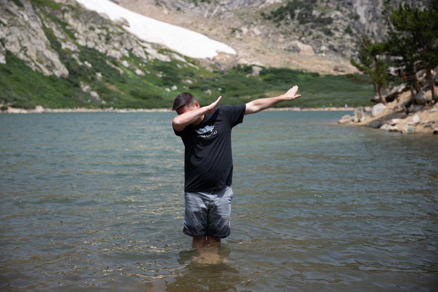 Same shirt, different vibe: Frank dabbing (yes, dabbing) in Lake Mary. Turns out Colorado adventure looks good on all of us.